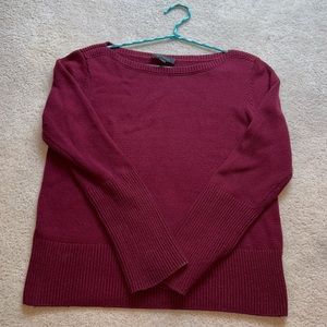 Red Ann Taylor sweater with tortoise buttons on sleeve